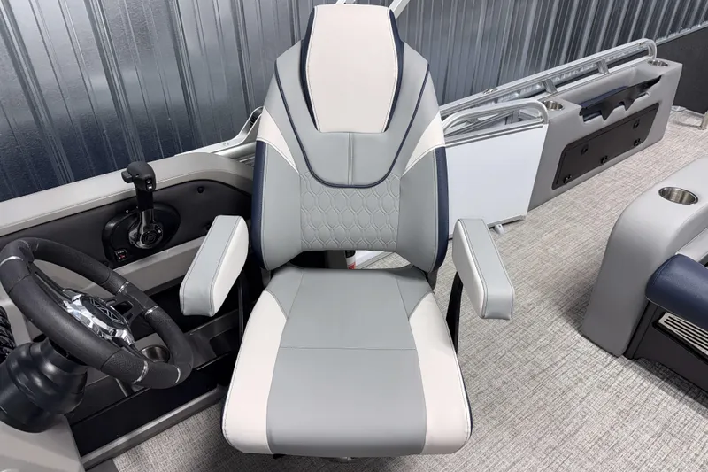 Slide: The Image of Captain's chair in 2026 Avalon LSZ 2385 VRB pontoon boat, featuring modern design and controls. - 15