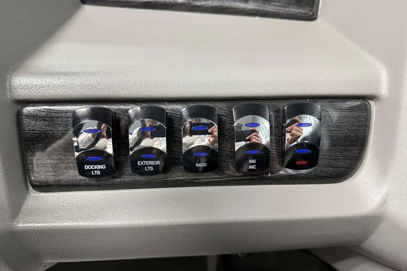 Slide: The Image of Control panel of Avalon LSZ 2385 VRB 2026 with labeled switches for lights and horn. - 21