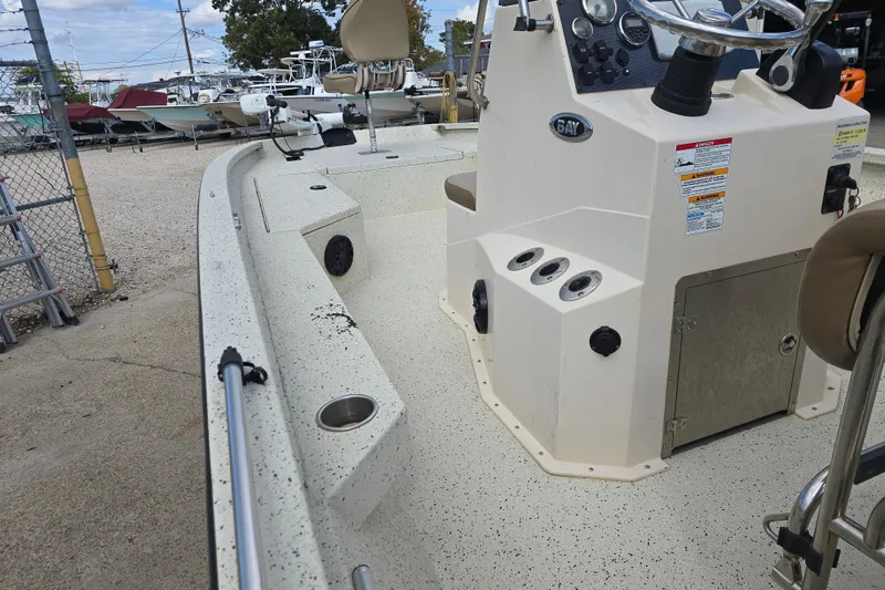 Slide: The Image of 2021 Xpress H22B Bay boat interior with steering console and seating. - 9