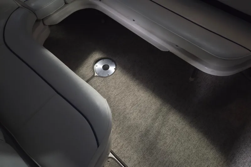 Slide: The Image of Interior seating area of a 1996 Sea Ray 290 Sundancer boat. - 18