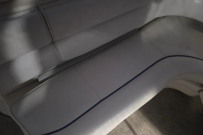 Slide: The Image of White leather seating on a 1996 Sea Ray 290 Sundancer boat. - 20