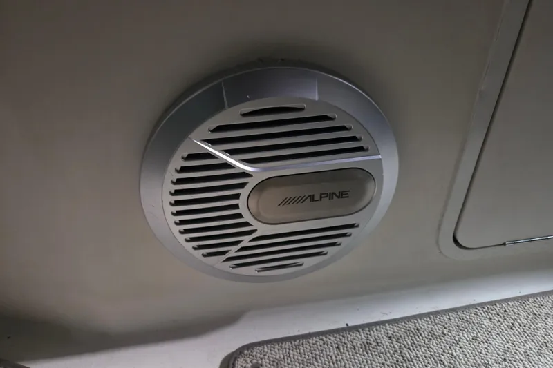 Slide: The Image of Alpine speaker installed on a 1996 Sea Ray 290 Sundancer boat interior. - 22