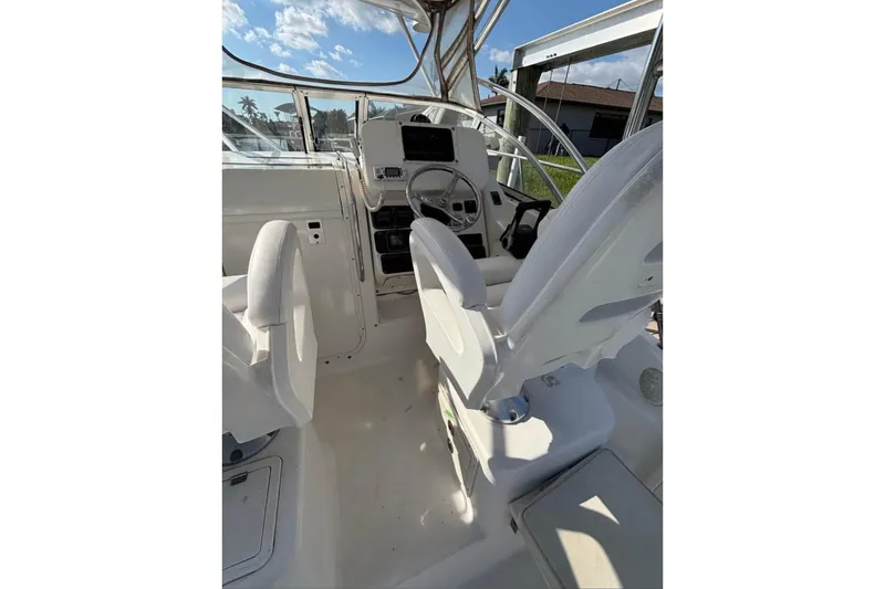 Slide: The Image of 2008 Century 2600 Walk-Around boat on a dock. - 3