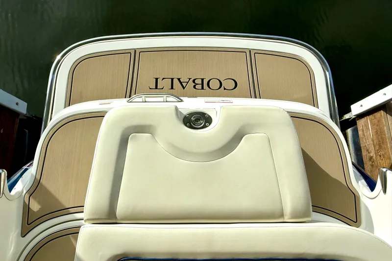 Slide: The Image of Rear view of a 2006 Cobalt 272 boat with cushioned seating and deck. - 30