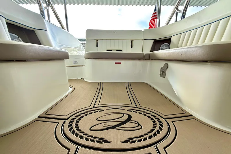 Slide: The Image of Interior of a 2006 Cobalt 272 boat with elegant seating and custom flooring. - 46