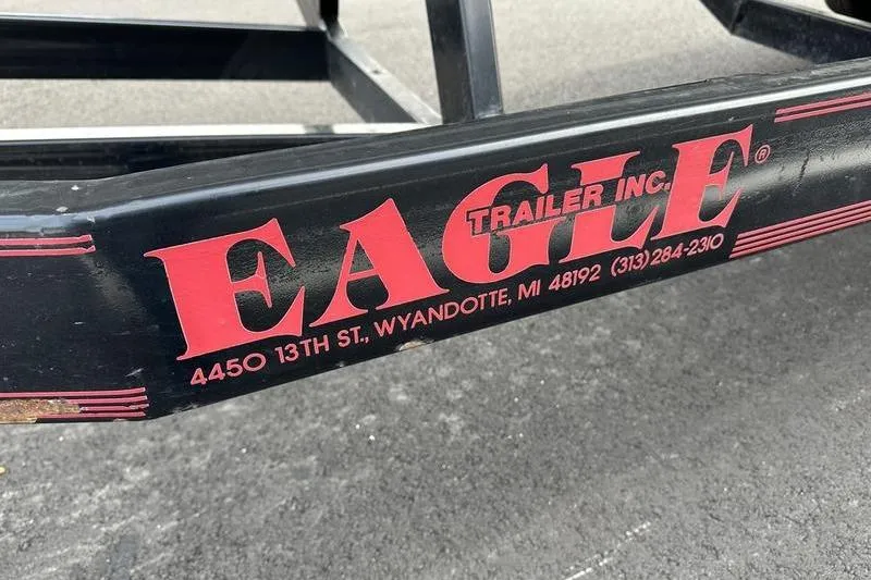 Slide: The Image of Eagle Trailer Inc. logo on black trailer frame, Wyandotte, MI address visible. - 22