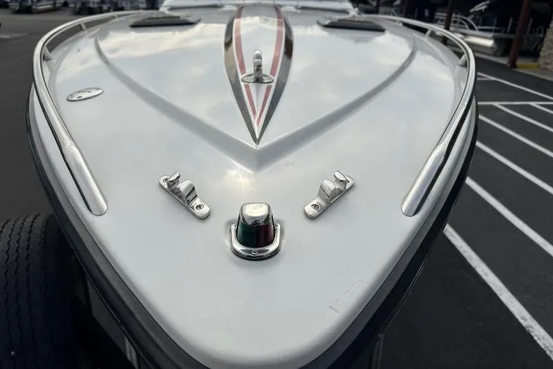 Slide: The Image of 1989 Formula 292 SR-1 boat bow with sleek design and chrome fittings. - 23