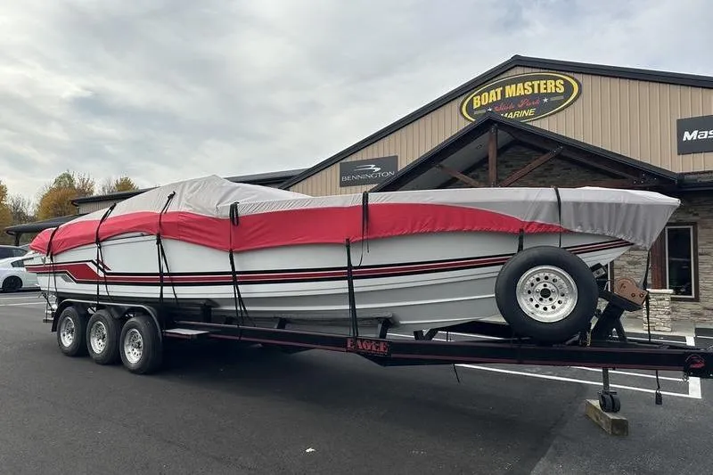 Slide: The Image of 1989 Formula 292 SR-1 boat on trailer, covered, outside Boat Masters Marine. - 4