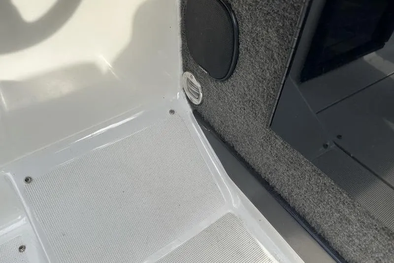 Slide: The Image of Interior detail of 1989 Formula 292 SR-1 boat, featuring carpeted panel and speaker. - 48