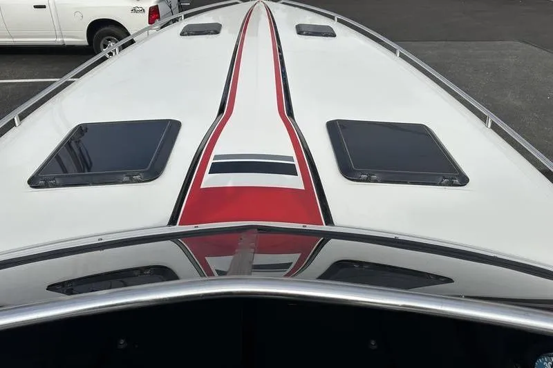 Slide: The Image of 1989 Formula 292 SR-1 boat deck with red and black stripe design. - 49