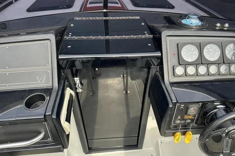 Slide: The Image of 1989 Formula 292 SR-1 boat dashboard with gauges and controls. - 53