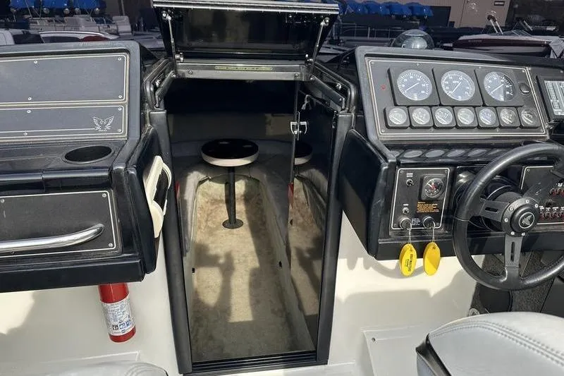 Slide: The Image of 1989 Formula 292 SR-1 boat cockpit with steering wheel and instrument panel. - 56