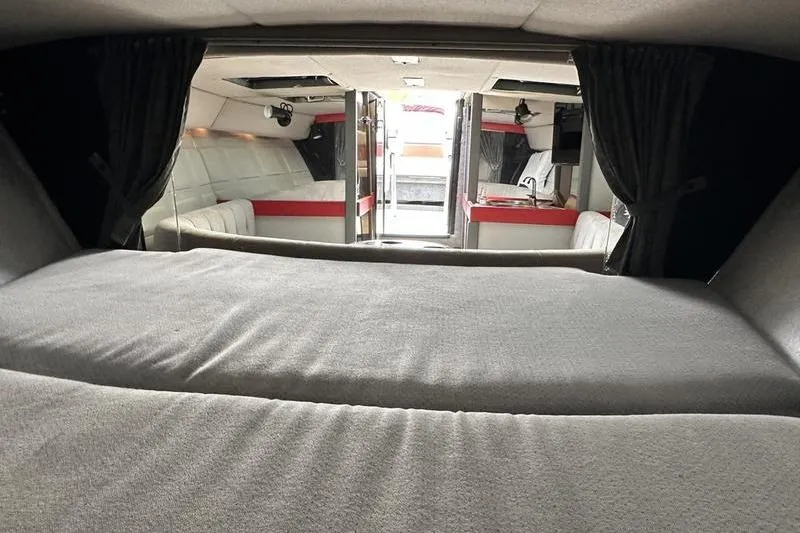 Slide: The Image of Interior of 1989 Formula 292 SR-1 boat, featuring cozy seating and modern design. - 65