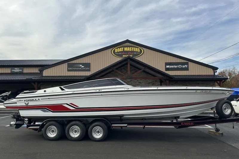Slide: The Image of 1989 Formula 292 SR-1 boat on trailer at Boat Masters Marine dealership. - 8