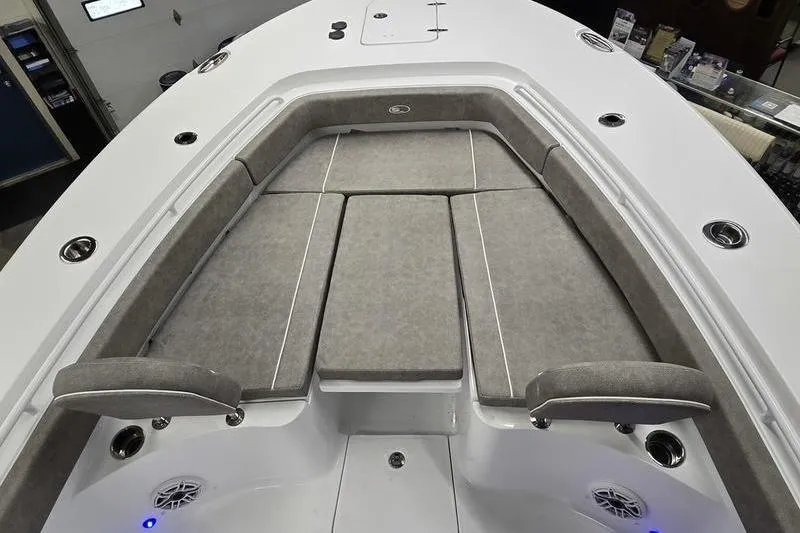 Slide: The Image of 2026 Sea Hunt Gamefish 25 boat interior with cushioned seating and modern design. - 4