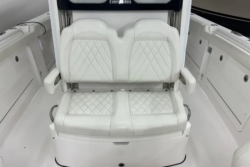 Slide: The Image of White leather seating on 2023 Everglades 285 Center Console boat, featuring diamond stitching. - 30
