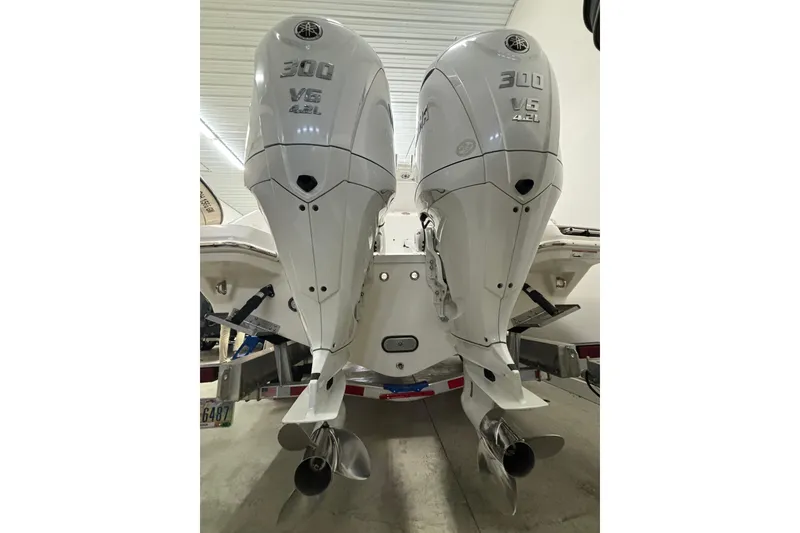 Slide: The Image of Twin Yamaha 300 V6 outboard engines on a 2023 Everglades 285 Center Console boat. - 37