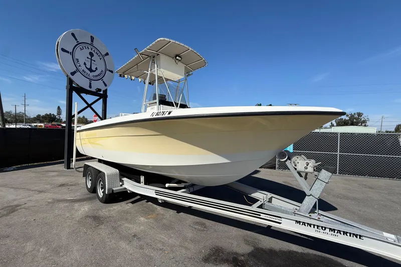 Slide: The Image of 2006 Hydra-Sports Lightning 212 CC boat on trailer, displayed outdoors. - 0