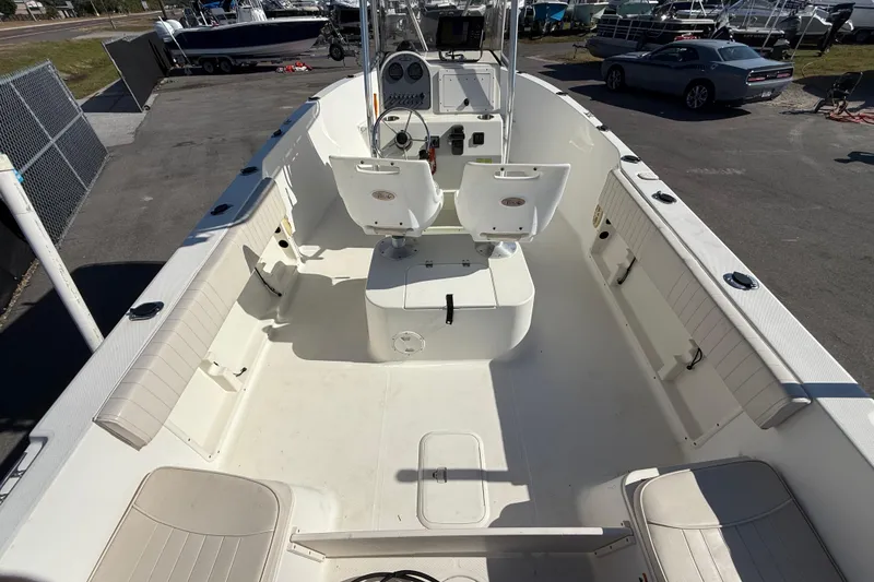 Slide: The Image of 2006 Hydra-Sports Lightning 212 CC boat interior with seating and console. - 14