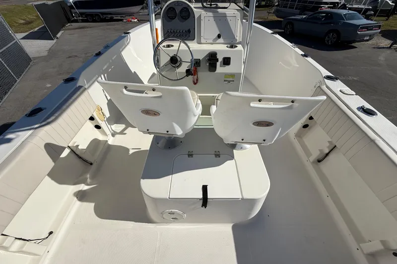 Slide: The Image of 2006 Hydra-Sports Lightning 212 CC boat interior with dual seats and steering console. - 19
