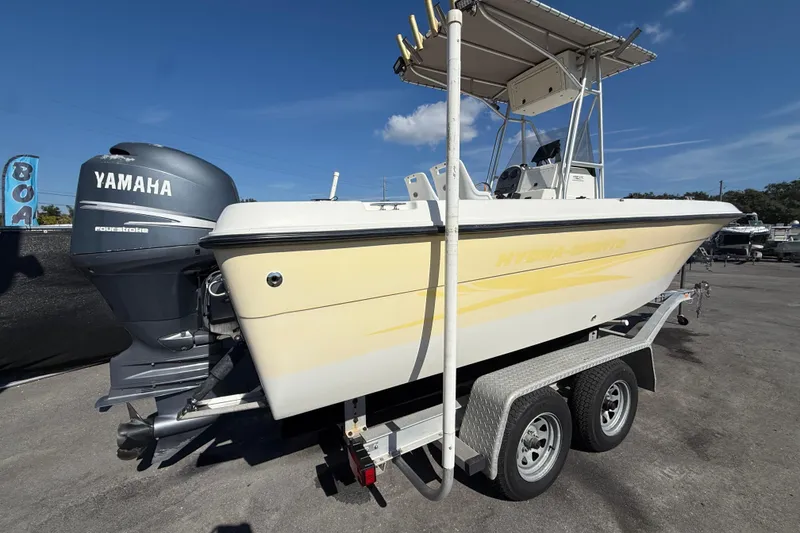 Slide: The Image of 2006 Hydra-Sports Lightning 212 CC boat with Yamaha outboard engine on trailer. - 2
