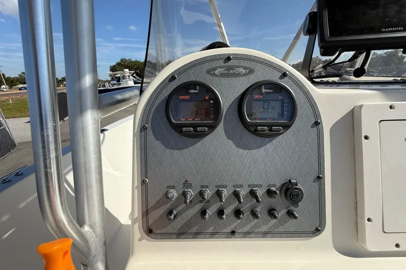 Slide: The Image of 2006 Hydra-Sports Lightning 212 CC dashboard with Yamaha speed and tachometer gauges. - 28