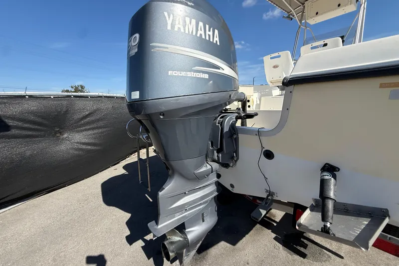 Slide: The Image of 2006 Hydra-Sports Lightning 212 CC with Yamaha outboard motor, parked outdoors. - 3