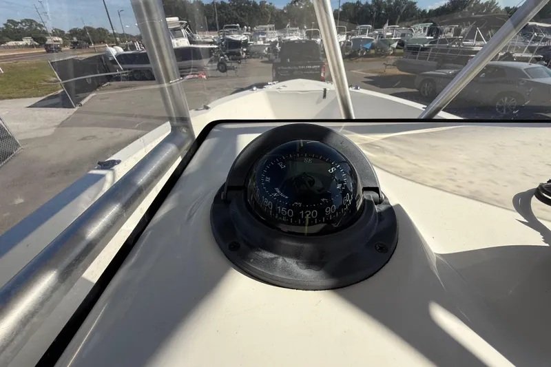 Slide: The Image of 2006 Hydra-Sports Lightning 212 CC boat compass view at marina. - 30