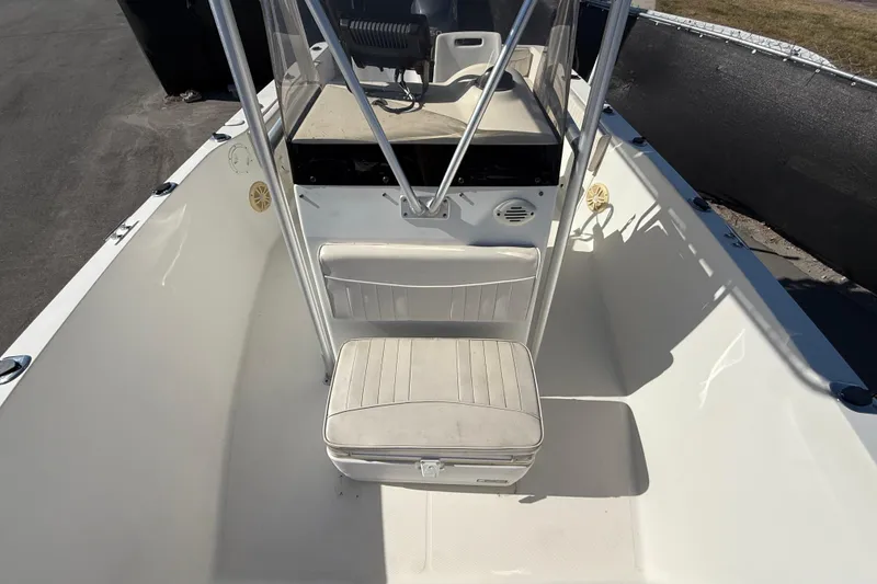 Slide: The Image of 2006 Hydra-Sports Lightning 212 CC boat interior with seating and console. - 57