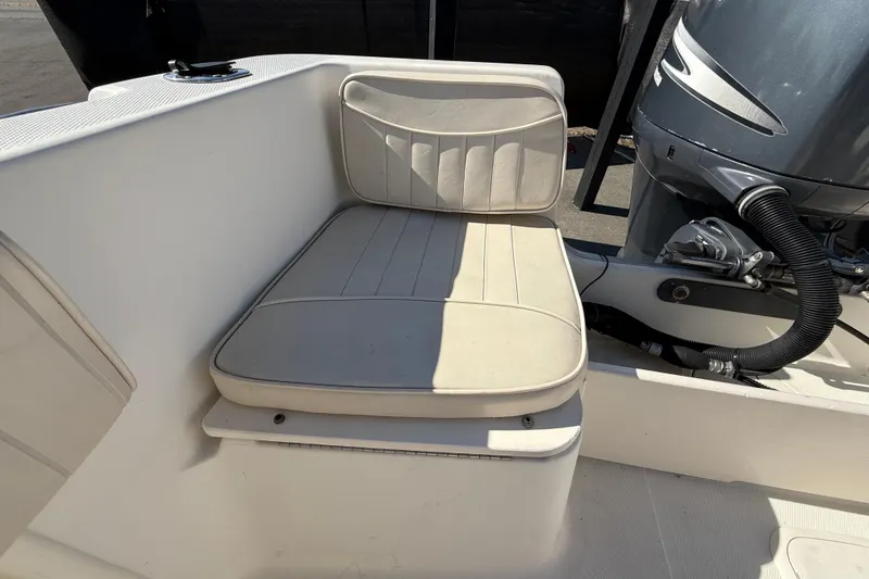 Slide: The Image of 2006 Hydra-Sports Lightning 212 CC boat seat and engine detail. - 68