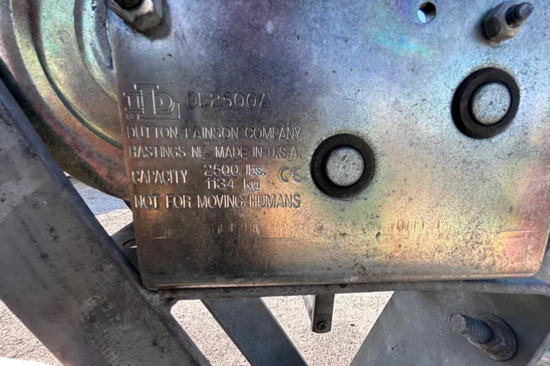 Slide: The Image of Close-up of a Dutton-Lainson winch plate, 2500 lbs capacity, on a 2006 Hydra-Sports Lightning 212 CC. - 75