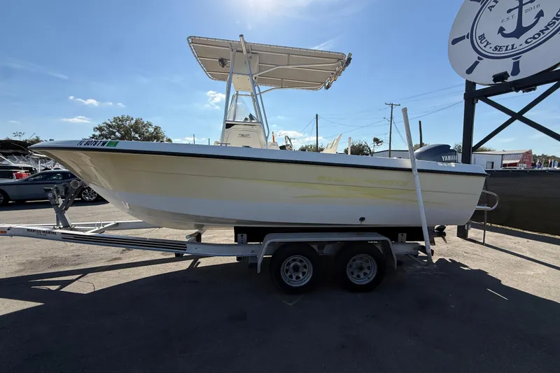 Slide: The Image of 2006 Hydra-Sports Lightning 212 CC boat on trailer under clear sky. - 8