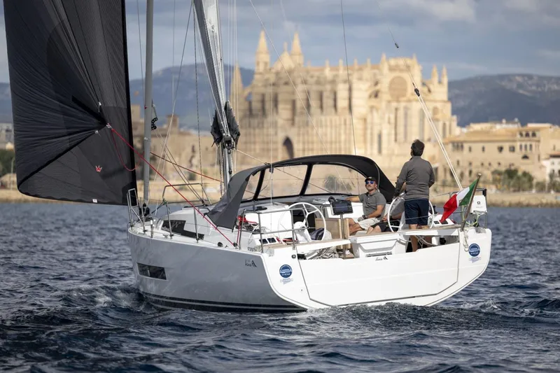 The Image of Sailing yacht Hanse 360, 2026 model, cruising near historic cathedral. - 0