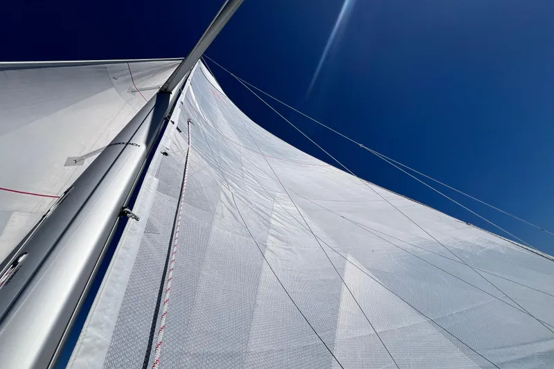 Slide: The Image of Sail of 2026 Hanse 360 yacht against clear blue sky. - 41