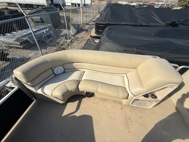 Slide: The Image of Harris Grand Mariner 230, 2012, beige seating on boat. - 4