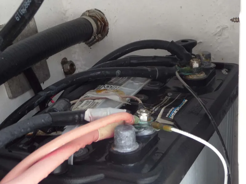 Slide: The Image of Battery setup in a 1985 Wellcraft Scarab 34 boat. - 23