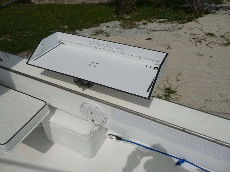 Slide: The Image of 1985 Wellcraft Scarab 34 boat with a Magma fish cleaning station. - 26