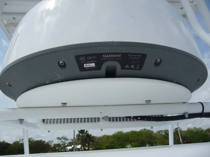 Slide: The Image of Garmin radar on 1985 Wellcraft Scarab 34 boat, clear sky background. - 27