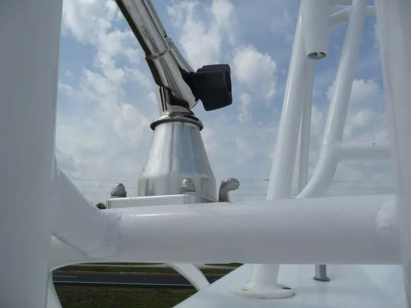 Slide: The Image of Close-up of Wellcraft Scarab 34 boat structure, 1985 model, against a cloudy sky. - 29