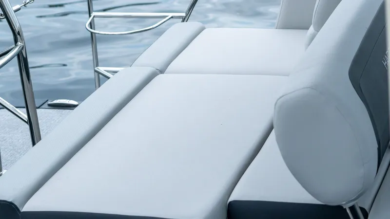 Slide: The Image of Harris Cruiser 230, 2026, luxurious boat seating by the water. - 15