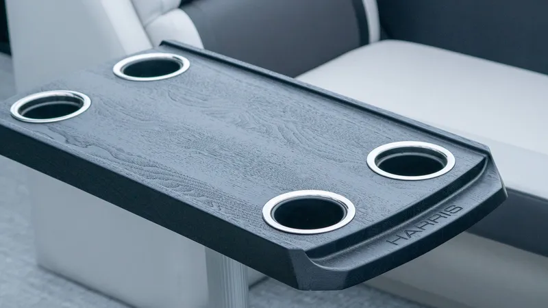 Slide: The Image of Harris Cruiser 230 table with four cup holders, 2026 model. - 17