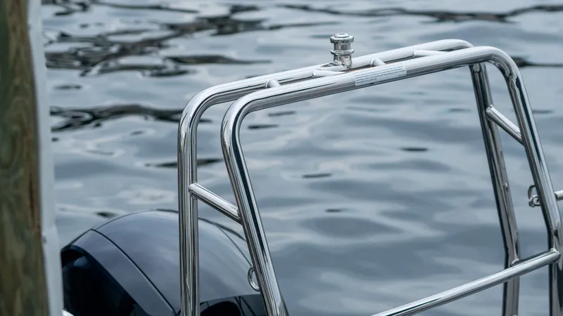 Slide: The Image of Harris Cruiser 230, 2026, by water with stainless steel railing. - 19