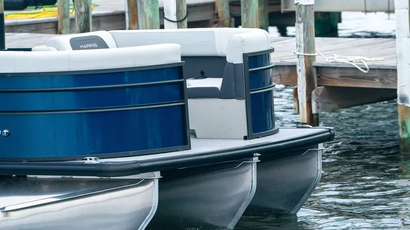 Slide: The Image of Harris Cruiser 230 pontoon boat at dock, year 2026. - 6