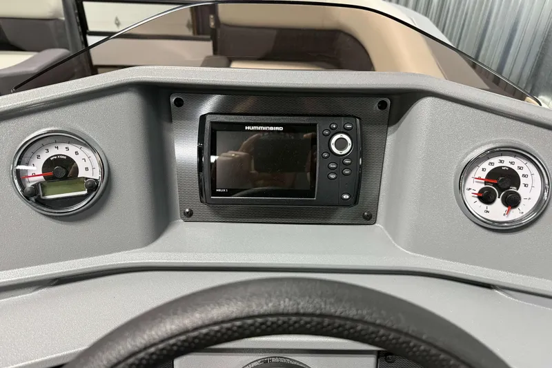 Slide: The Image of Dashboard of 2026 Sylvan R 20 LZ DH with gauges and Humminbird display. - 10