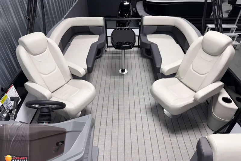 Slide: The Image of 2026 Sylvan R 20 LZ DH pontoon boat interior with plush seating and modern design. - 5