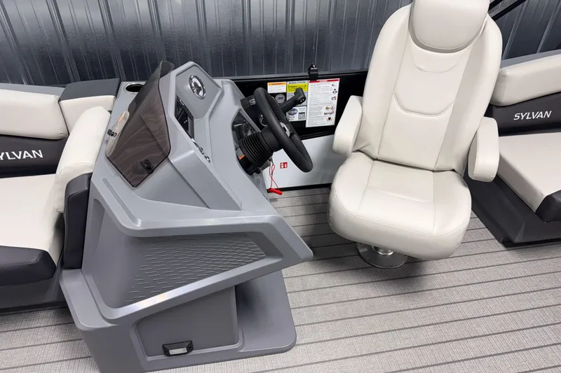 Slide: The Image of Interior of 2026 Sylvan R 20 LZ DH boat with modern helm and seating. - 7