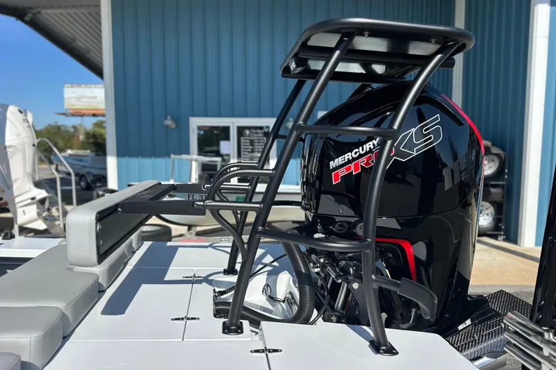 Slide: The Image of 2025 East Cape VHP boat with Mercury Pro XS engine, docked outdoors. - 11