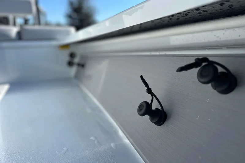 Slide: The Image of 2025 East Cape VHP boat interior detail with sleek design and modern fixtures. - 18