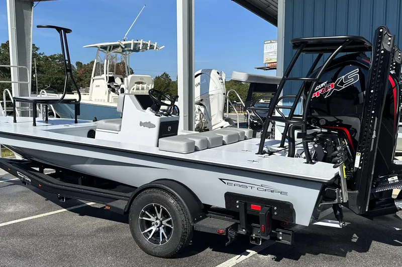 Slide: The Image of 2025 East Cape VHP boat with Mercury Pro XS engine on trailer. - 2