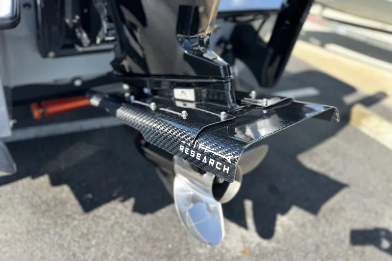 Slide: The Image of 2025 East Cape VHP boat motor with carbon fiber component labeled "Research." - 7